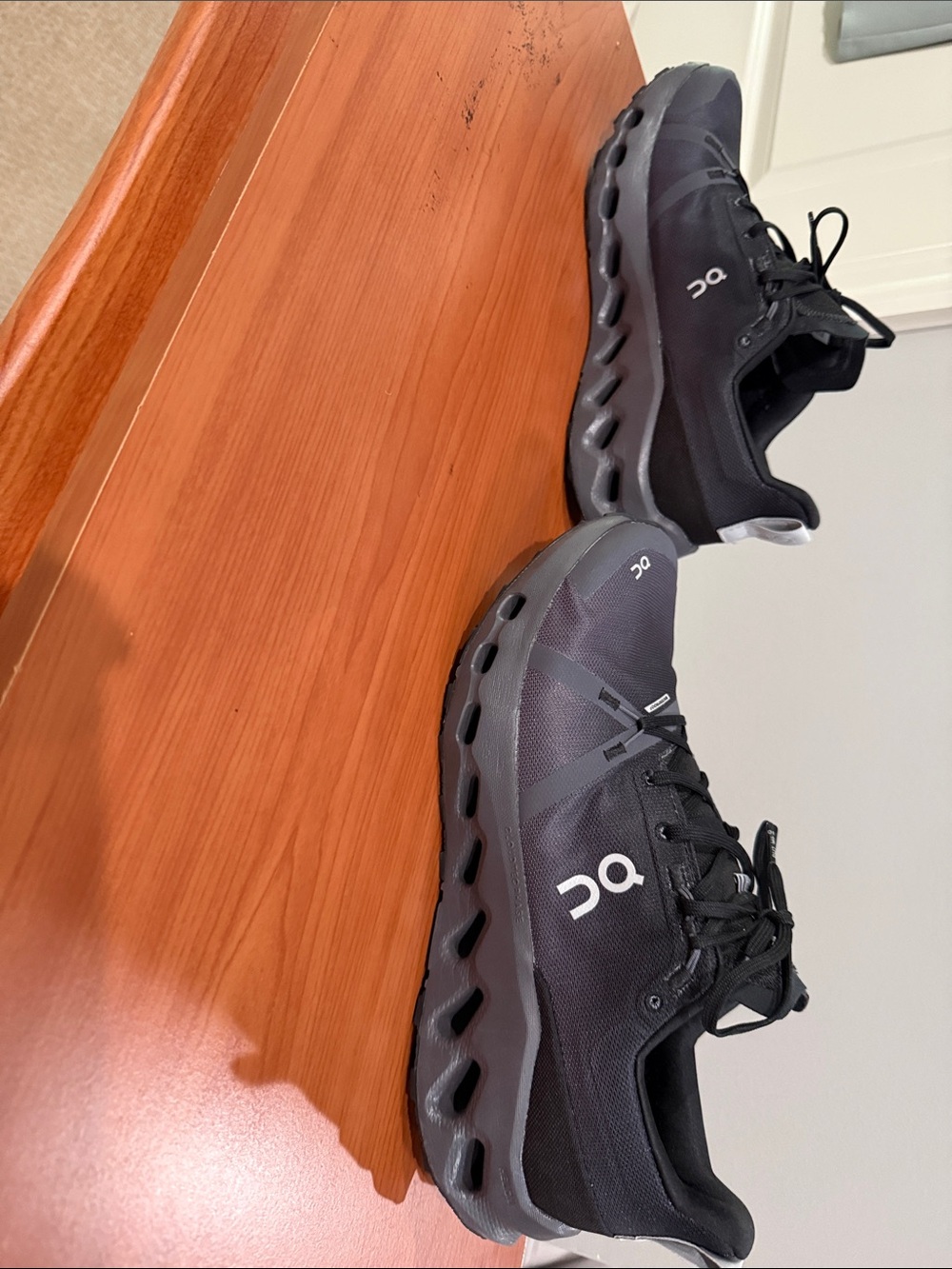 On Running Men's Cloud Surfer waterproof Black Athletic Sneakers with Gray Sole